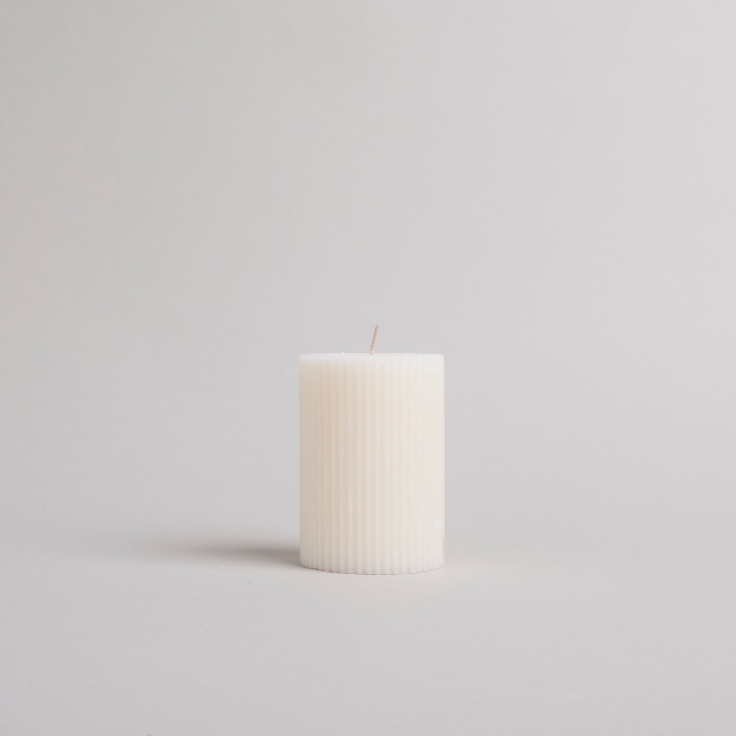 Block candle grooves 70 x 100 white (pack = 6 pcs)