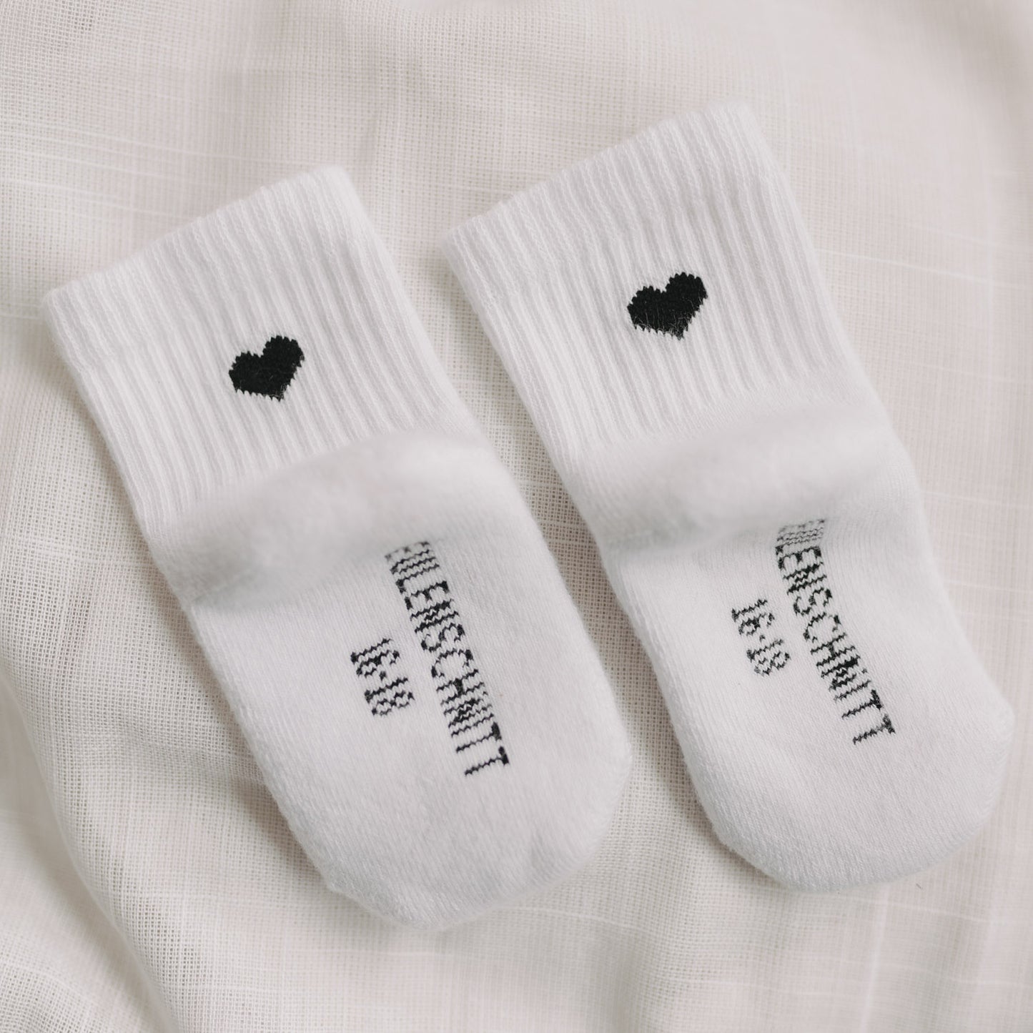Babysocken Herz schwarz (VE = 5 Stk.)