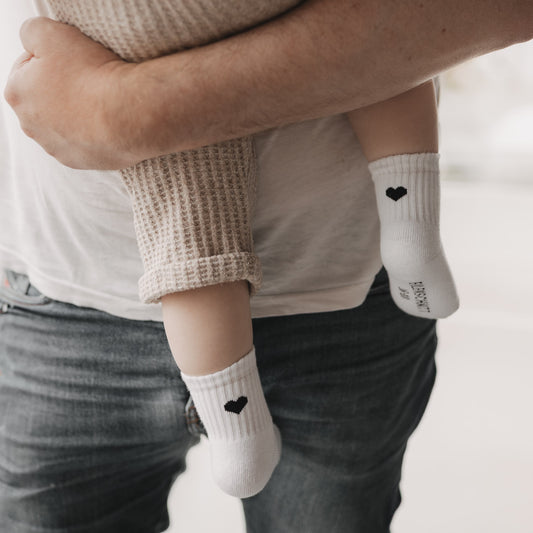 Babysocken Herz schwarz (VE = 5 Stk.)