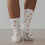 Socken Allover Herzen rot (VE = 5 Stk.)